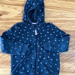 Girl’s zip-front hoodie.